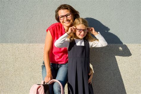 Mother And Daughter Trying Eyeglasses Frames Photo Free Download