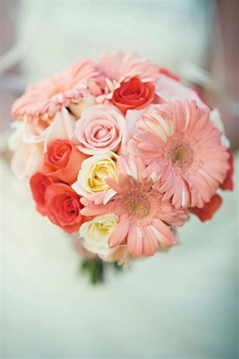 Lovely Bridal Bouquet Featuring Ivory Roses Pink Roses Coral Roses