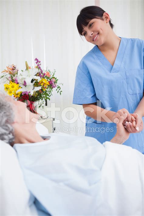 Nurse Holding The Hand Of A Senior Patient Stock Photo Royalty Free
