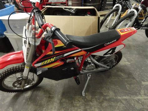 Razor mx350 dirt rocket kids ride on 24v electric toy motocross motorcycle dirt bike, speeds up to 14 mph, red. Razor Electric Dirt Bike
