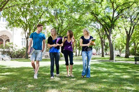 Group Of College Students Walking In Campus Ground Brentwood Associates