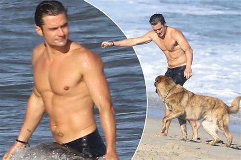 Orlando Bloom Strips Off Again As He Flaunts Chiseled Abs