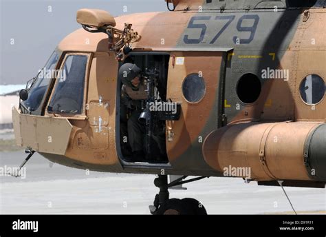 An Afghan Air Force Aerial Gunner Clears The Left Side Of His Mi 17