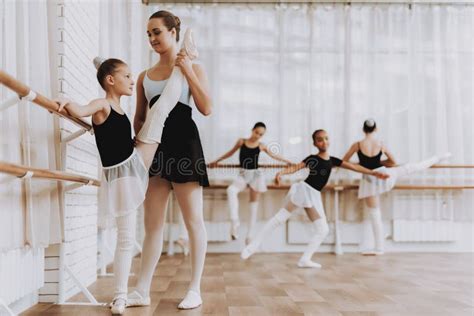 Ballet Training Of Group Of Girls With Teacher Stock Photo Image Of