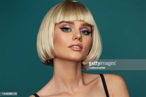 female wearing blonde wig photos and premium high res pictures getty images