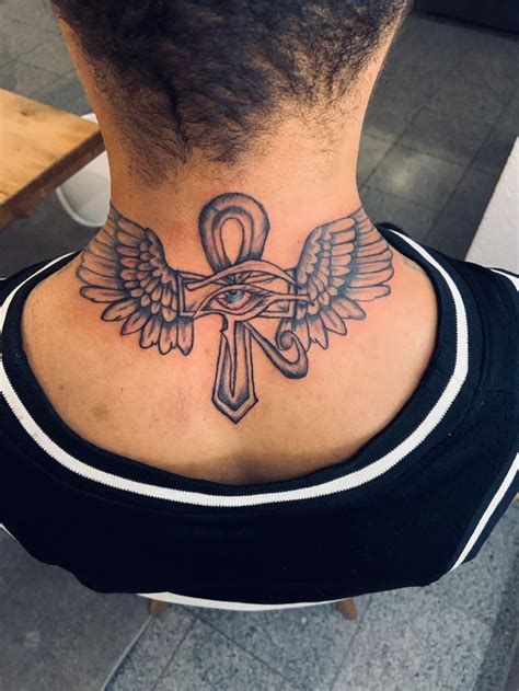 But those who hope in the lord will renew their strength. Tattoo neck « cross of Ankh, eye of Horus and wings