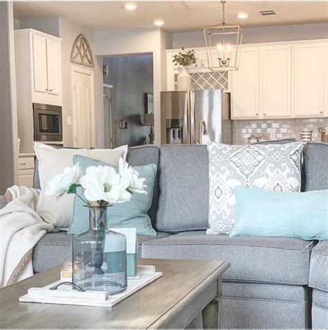 Blush is the perfect shade to take your decor from girly to chic, especially when combined with a gray color scheme. Love this! | Teal living rooms, Gold living room, Grey family rooms