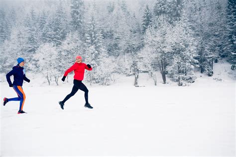 Two Women Trail Running On Snow In Winter Mountains The Swiss Quality