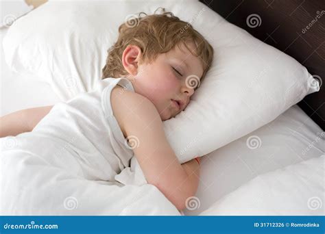 Little Sweet Toddler Boy Sleeping In His Bed Royalty Free Stock Image
