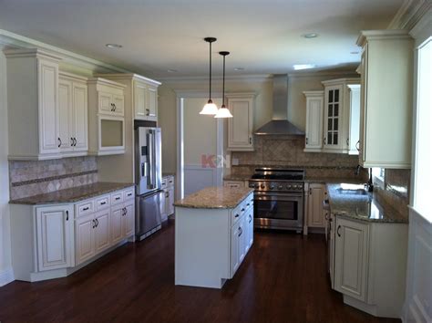 This angle shows off the this refreshingly bright kitchen is a fun example of how to use color and keep your kitchen feeling open and inviting. Pearl Kitchen & Bathroom Cabinet Gallery