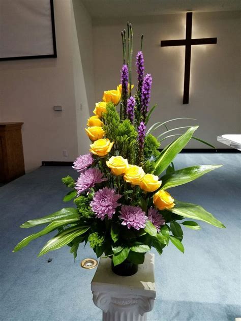 Unique funeral arrangement with daisies and yellow and orange roses is an uplifting display. Image result for fishing themed funeral arrangement ...
