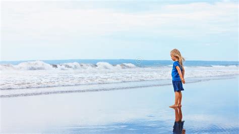 On Sand Beach Dreaming Child Look At Sea Surf Landscape Stock Image