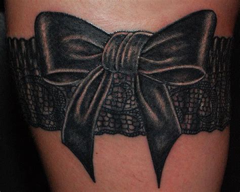 Garter Tattoo The Detail Is Awesome Cover Up Garter Tattoo Thigh