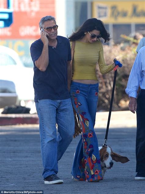 Amal Clooney Goes Retro In Flares And Fringes As She Pays