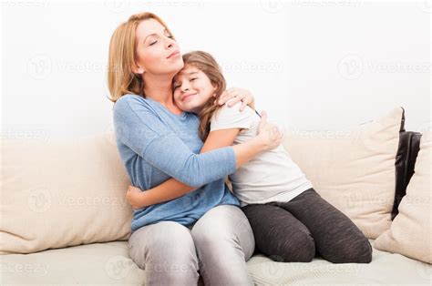 Beautiful Mother And Young Daughter Hugging 1251167 Stock Photo At Vecteezy