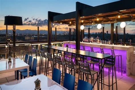 The Best 12 Rooftop Bars For Stunning Skyline And Mountain Views In