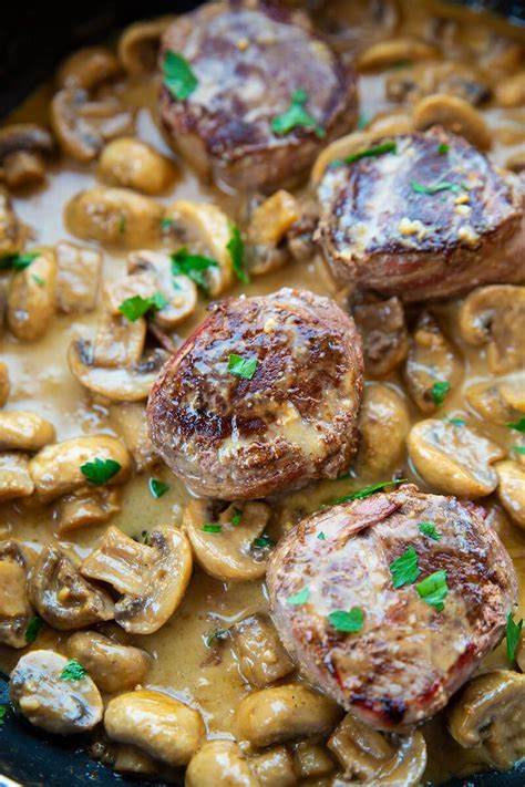 While the tenderloin finishes cooking or while your steaks are resting, add a. Bacon Wrapped Beef Tenderloin With Creamy Mushroom Sauce ...