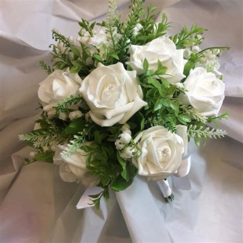 A Wedding Bouquet Collection Of Foam Roses And Lily Of The Valley Flower