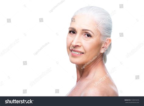 Beautiful Smiling Naked Senior Woman Isolated Stock Photo