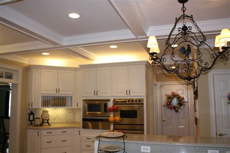 This coffered ceiling includes a break where the box beams reflect the kitchen island below. Coffered Ceiling Makes This Kitchen Look Great!