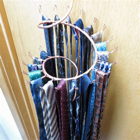 My husband is very fond of ties. Various Wall Mounted Tie Racks - HomesFeed