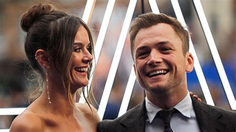 Taron Egerton Shows Off Some PDA With His Girlfriend At 'Rocketman ...