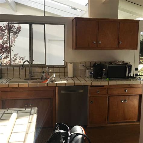 But before we start let's take that walk down. Before and After: Inside a Stunning 1950s Kitchen Remodel