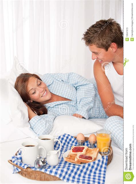 Young Couple Having Breakfast In Bed Stock Image Image