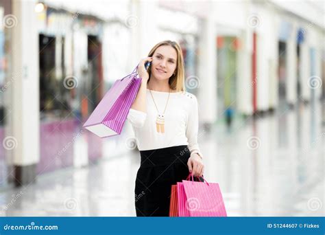 Beautiful Young Woman On Phone In Shopping Center Stock Image Image