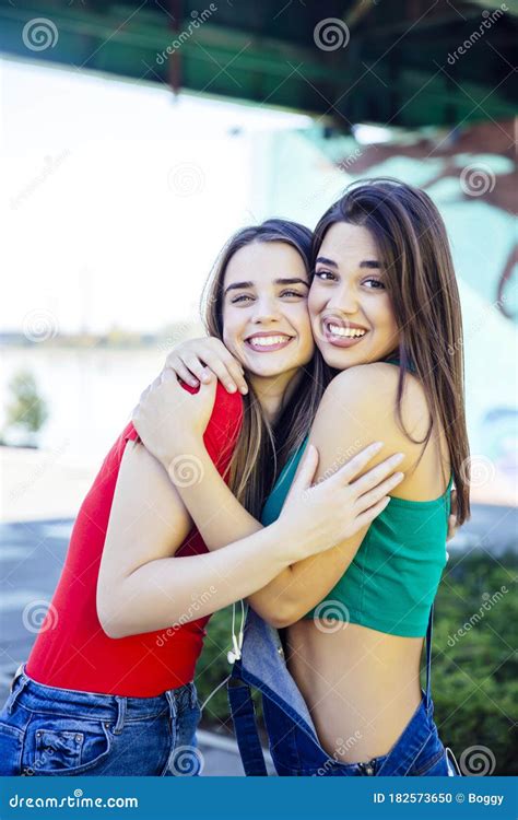 Two Best Female Friends Embracing Together Stock Photo Image Of Girls
