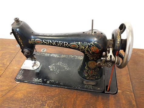 Singer sewing machines have a long and rich history, dating as far back as 1851. Vintage Singer Treadle Sewing Machine with Cabinet | Used ...