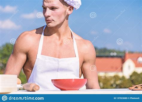 Chef Cook With Nude Muscular Torso Man On Confident Face Wears Cooking Hat And Apron Skyline