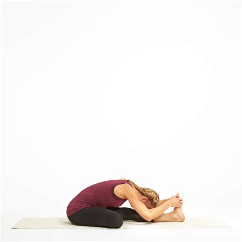 Seated Half Lotus Forward Bend Pose