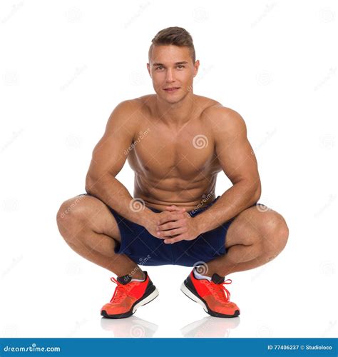 Crouching Fit Man Posing Stock Image Image Of Muscle 77406237