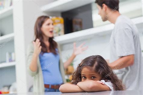 Sad Girl Listening To Her Parents Arguing — Stock Photo