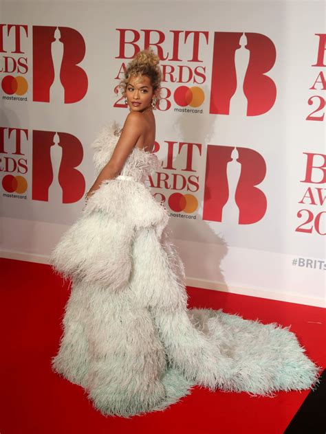 This week, we announced the shortlist for 2018 weddingsutra photography awards. Rita Ora at the 2018 BRIT Awards in London | Wedding dresses lace, Rita ora, White formal dress