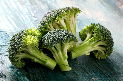 Healthy Green Organic Raw Broccoli Florets Ready For Cooking Stock