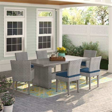 Huge range of luxury rattan garden furniture. Sol 72 Outdoor Rochford 7 Piece Rattan Dining Set with ...