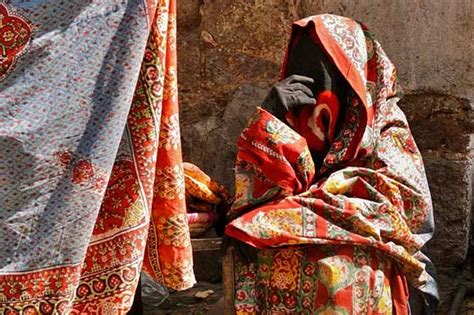 Yemeni Clothing A Woman In A Colorful Printed Sitara At The Market By Maarten De Wolf Yemeni