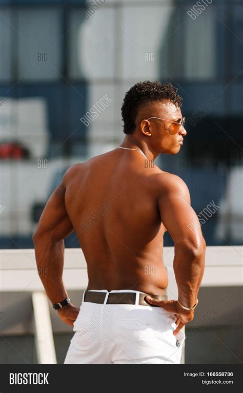 We mow circles around the competition! Hot Beautiful Black Guy Bulging Image & Photo | Bigstock