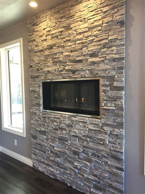 Contemporary Linear Fireplace With Silver Lining Stacked Stone No