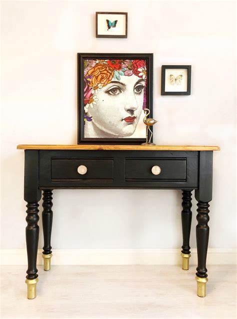 By using particle board with a slice of wood as top layer instead of only solid wood in this product, we use less wood per product. Vintage Black & Gold Console Table with Natural Wooden ...