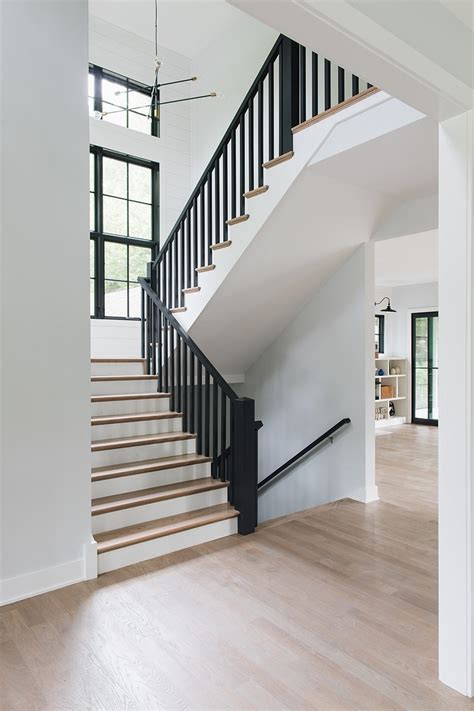 Stair railings are important features that should always be considered when building homes and other structures that require stairs. Modern Farmhouse House Tour - Home Bunch Interior Design Ideas