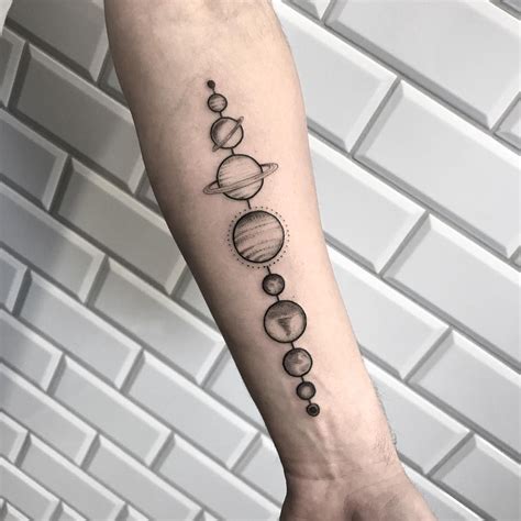 Lined Planets Tattoo On The Left Forearm Planet Tattoos Forearm