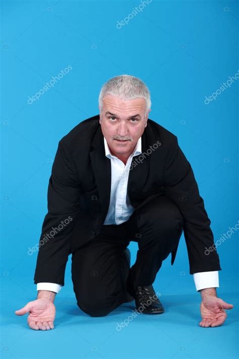 Kneeling Businessman Stock Photo By ©photography33 9806975