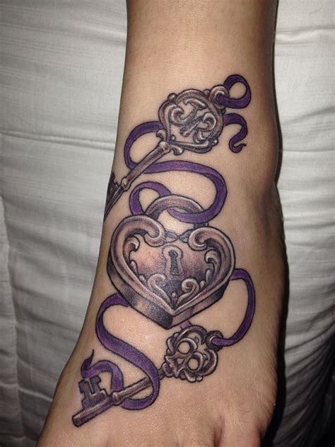 A unique twist on the traditional lock and key tattoos is to transform the shape of the lock into a heart, and have a persons name tattooed within. 35 Meaningful Lock And Keys Tattoos - nenuno creative