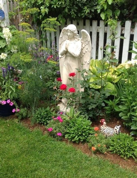 Garden Statues Tips To Make Them Look Stunning In Your Yard Angel Garden Ideas Garden