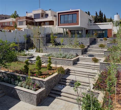 Terraced Landscaping Provides This Home With Multiple Gardens Terrace