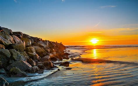Sunset Coast Sea Stones Breakwater Seascape Hd Wallpaper Peakpx