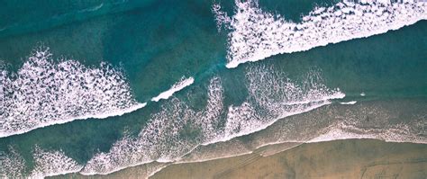 Download Wallpaper 2560x1080 Beach Waves Surf Shore Sand Ocean
